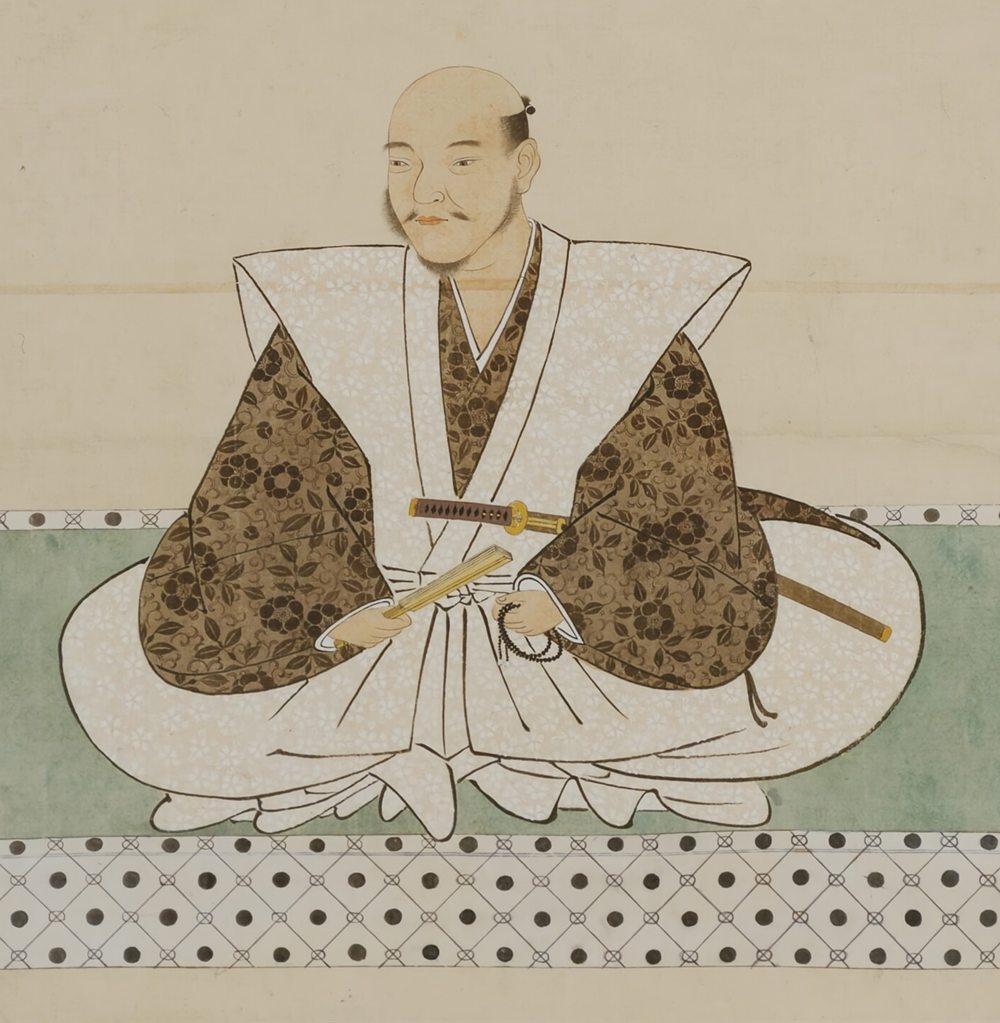 Portrait of Takenaka Shigeharu (Hanbei) seated, holding a fan and prayer beads