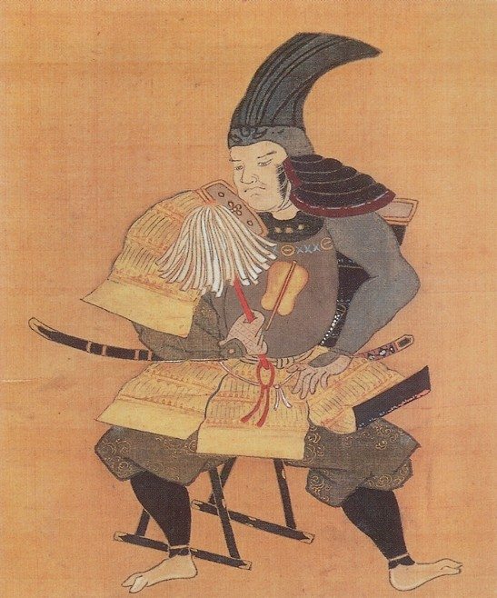 Portrait of Takenaka Hanbei in armor and a tall ichi-no-tani helmet, seated on a camp stool