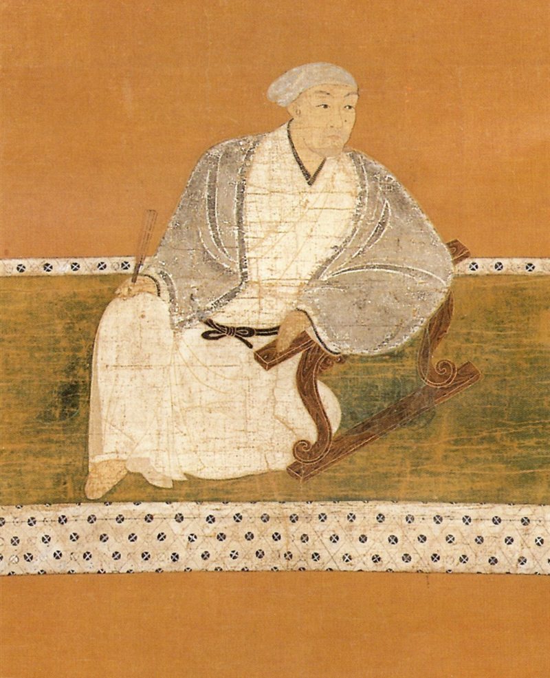 Portrait of Kuroda Josui wearing a hood and leaning on an armrest, held at Sōfuku-ji Temple