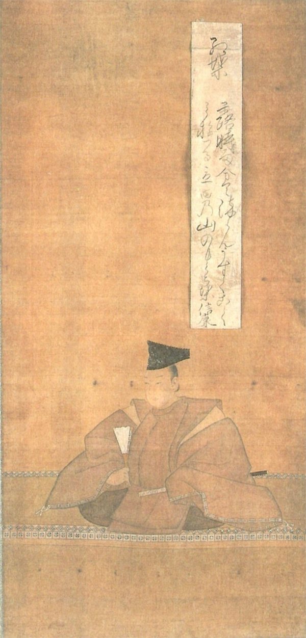 勝蓮寺に伝わる松平信康の肖像画。上に歌を書いた短冊があり、下に黒い烏帽子をかぶり、淡い朱色の狩衣と褐色の袴を身につけて扇を持って座る武将が描かれている