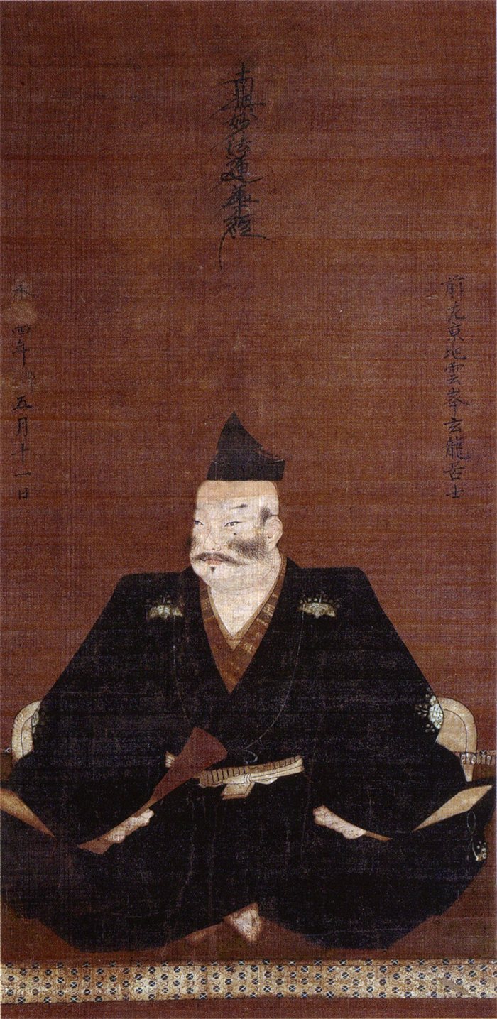 常在寺に伝わる斎藤義竜像。黒い衣の人物が座っている肖像画