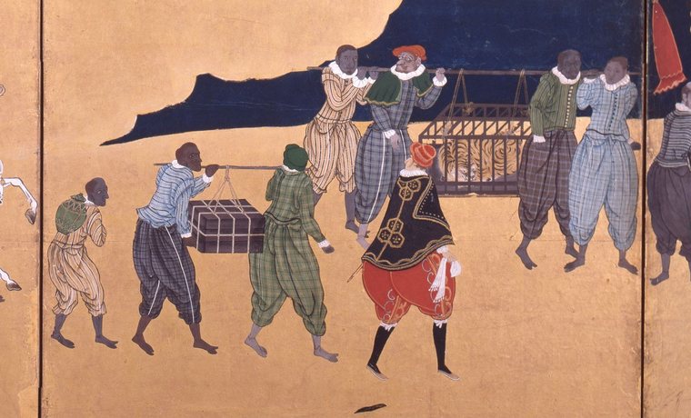 Detail of a Nanban folding screen showing men, some of them apparently African, carrying cargo and a caged tiger from a Portuguese ship